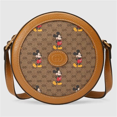 See Gucci's Mickey Mouse Collection: Handbags, T 